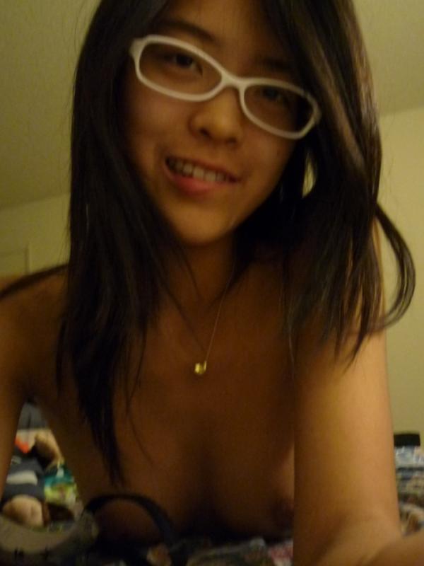 Hot Asian Webcam Teen In Glasses Playing